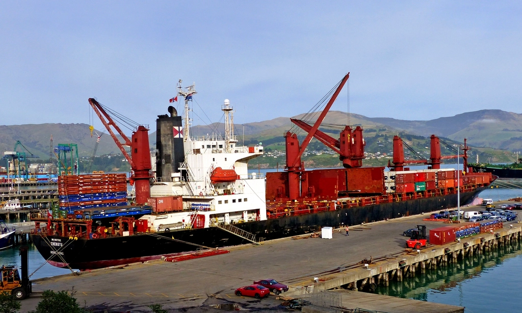 Cargo vessel being worked at a port
